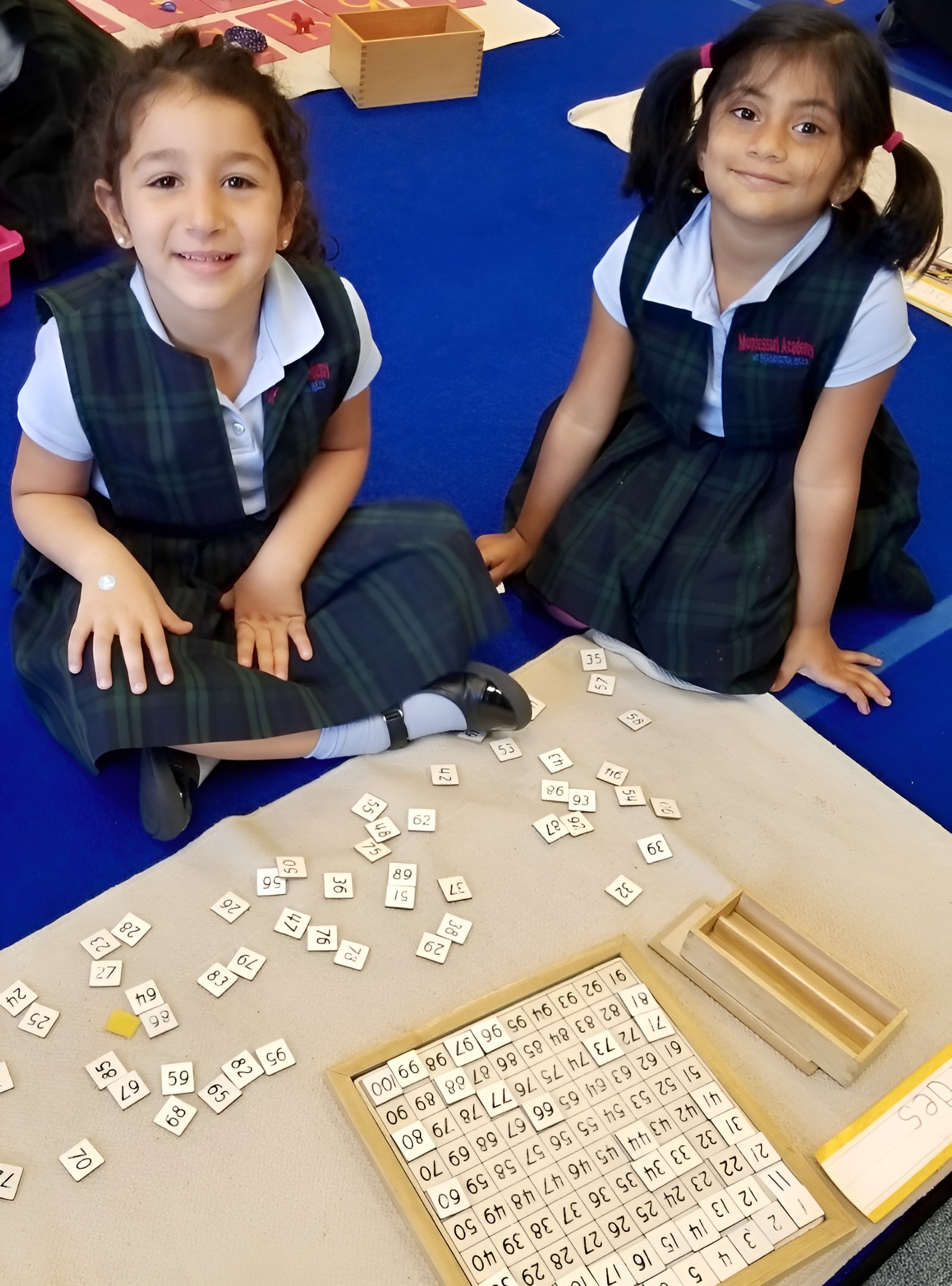 A student engaged in focused Montessori work