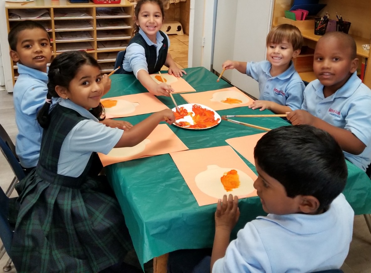 A student working with Montessori materials