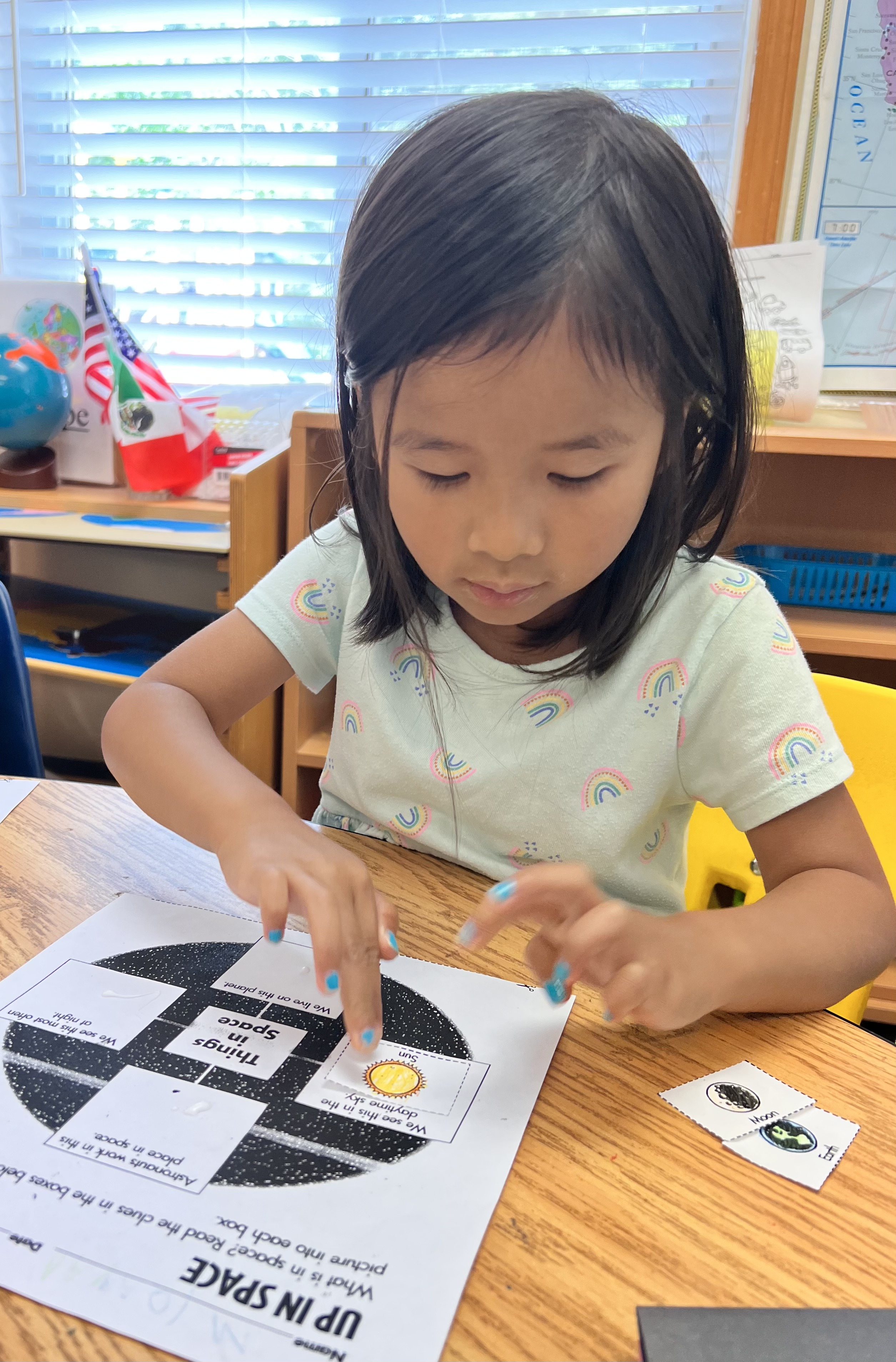 A Canton child engaged in language work